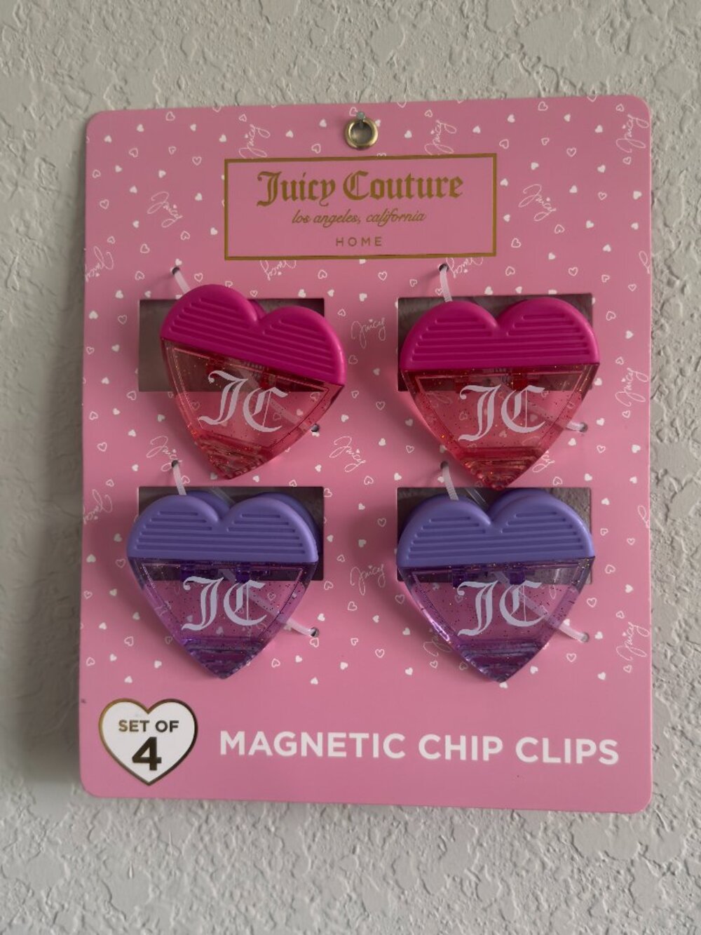 Set of four heart-shaped magnetic clips for bags by Juicy Couture